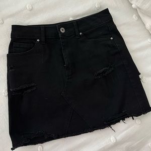 Black denim mini skirt